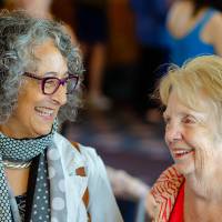 Two guests laughing.